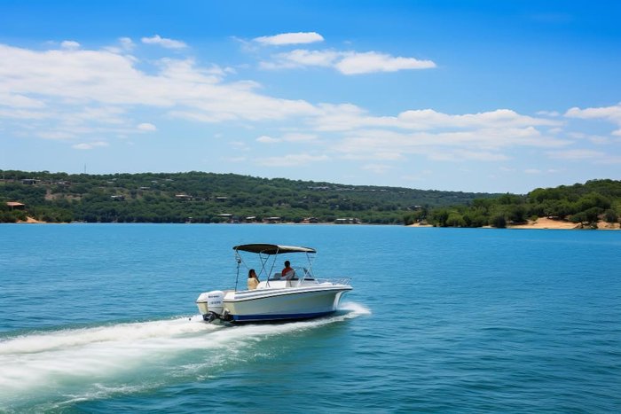 Boat underway on open water on a clear summer day