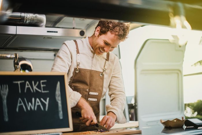 Small business owner at work in their food truck